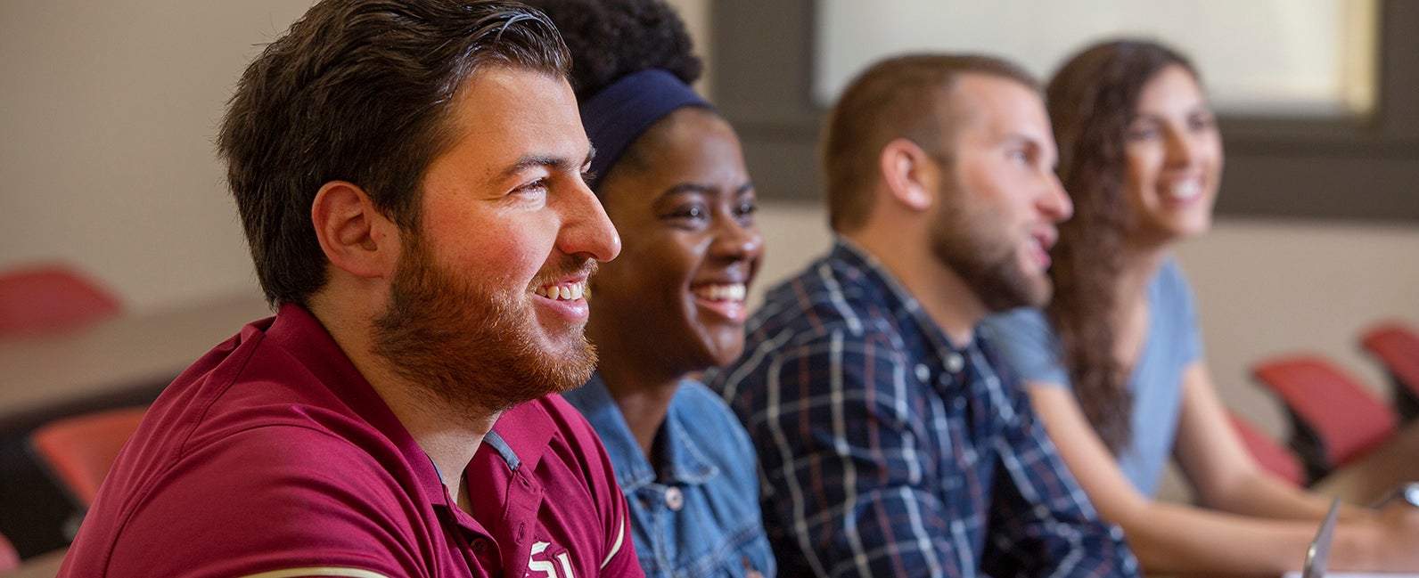 "Doctoral Program Admissions Header - picture of students in a classroom."