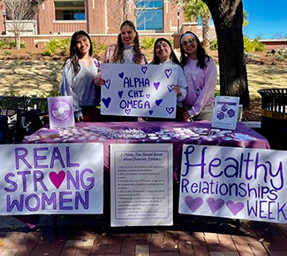 "Alpha Chi Table for Health Relationships Week"