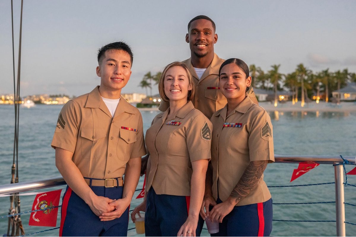 "Dybalski with fellow Marines at her last Marine Corps Ball, held on a boat for their unit stationed in Key West, Florida."