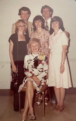 "Photo of Garvey Family with Jean Garvey seated surrounded by her five children circa the 1970s."