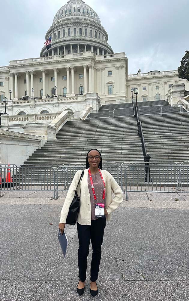 "Jalynn posing in front of a building while touring Washington, DC"
