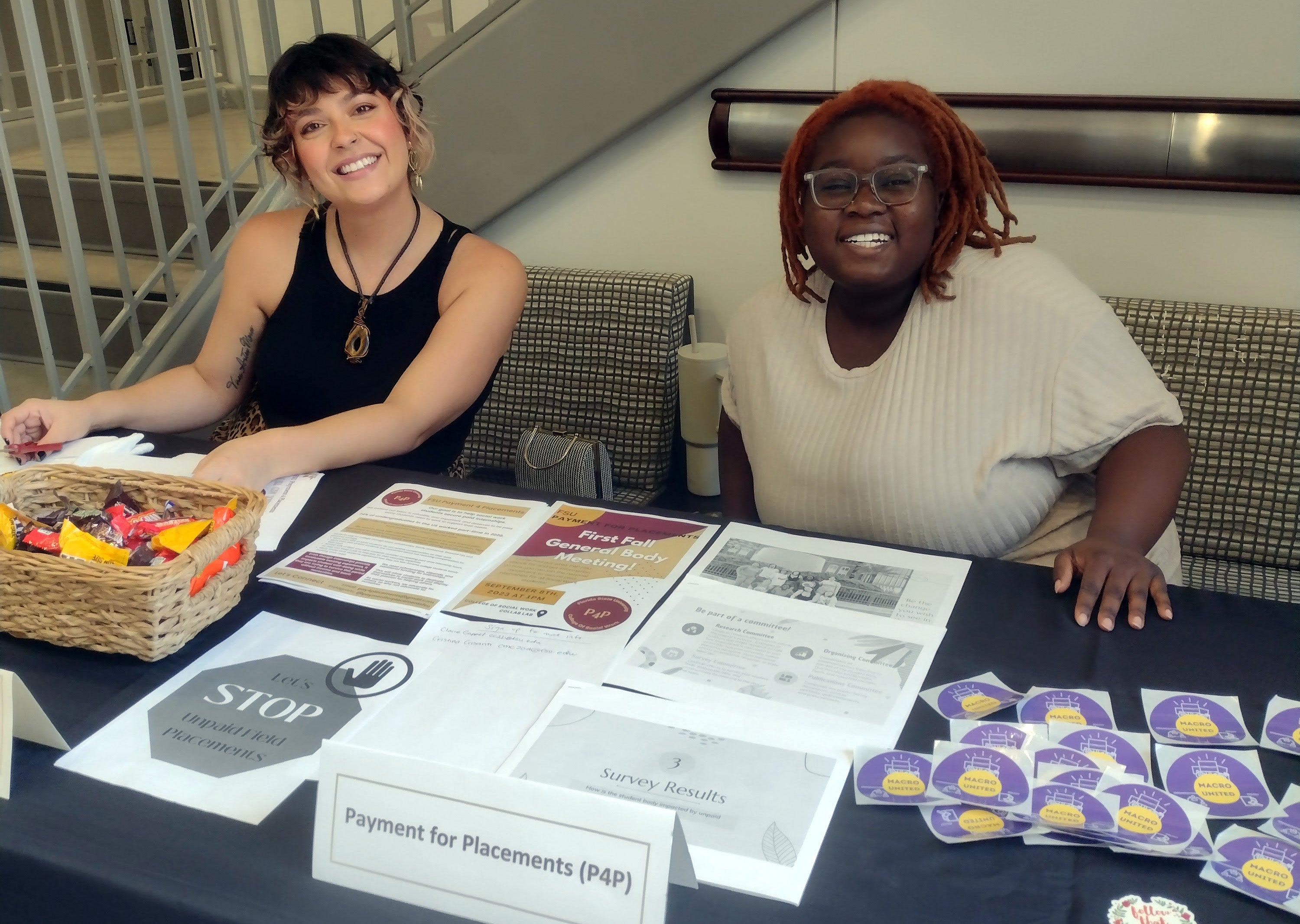 "Students tabling for Payment 4 Placement in the College of Social Work lobby"
