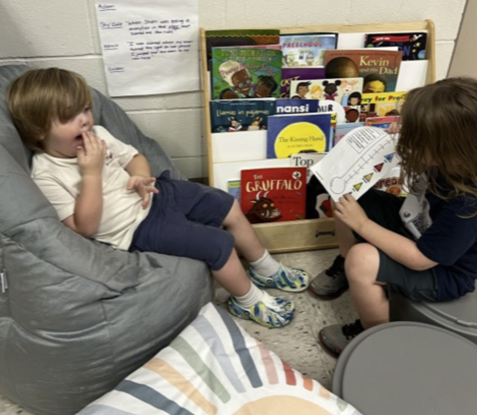 "Preschool students using the emotion meeter with one another during their school day."