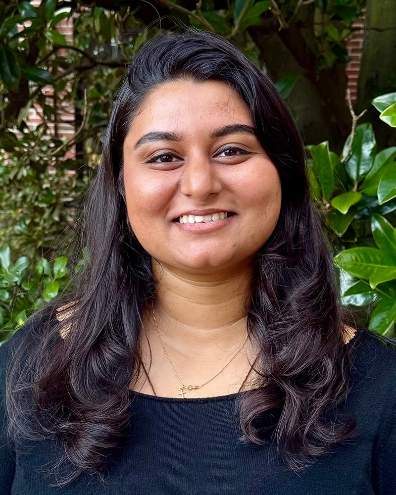 Headshot of Sherin Thomas.