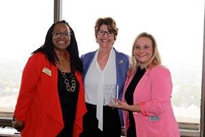 Andre Aubrey posing with leadership from NASW Florida