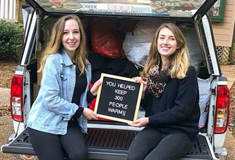 Emily Payton and Savannah Pierce with donations