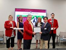 Tallahassee Chamber of Commerce Presenting a Certificate to the FSU Multidisciplinary Center.