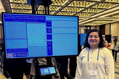 Dr. Pooja Ichplani presenting a research poster at the 2026 Society for Social Work and Research conference.