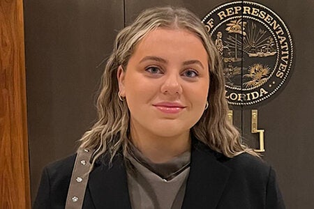 Headshot of Swedish exchange student Beatrice Pap posing at the Florida Capitol building.