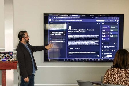 Dr. Yaacov Petscher demonstrating vibe coding at an interactive session.