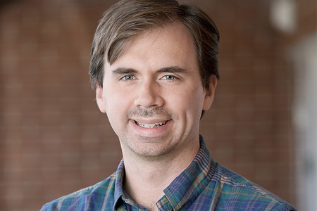 Headshot of Zach Cooper.