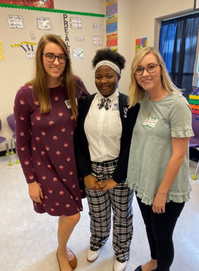 "Photo: FSU CSW student facilitator, Hannah Kinnon, and CFC Center staff facilitator, Savannah Smith, with one Journey of Hope participant in the 8th grade girl group at Crossroad Academy Charter School."