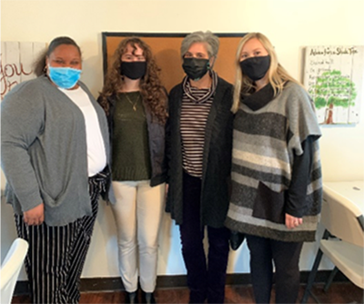 "Photo (left to right): Bennie Brown (ShadeTree MSW Intern), Kiersten Kelly (CFC Center Graduate Assistant), Ellen Piekalkiewicz (CFC Center Director), Savannah Smith (CFC Center Clinical Program Associate) at ShadeTree"