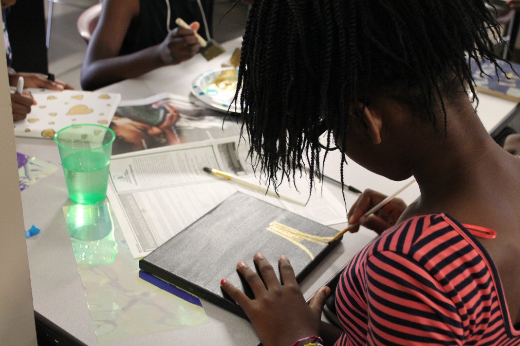 Campers working on their legacy art project.