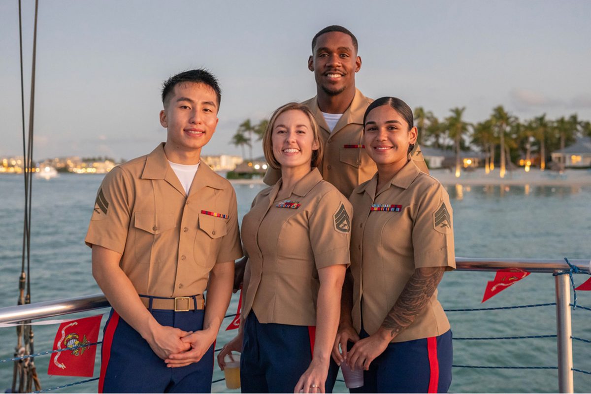 "Dybalski with fellow Marines at her last Marine Corps Ball, held on a boat for their unit stationed in Key West, Florida."