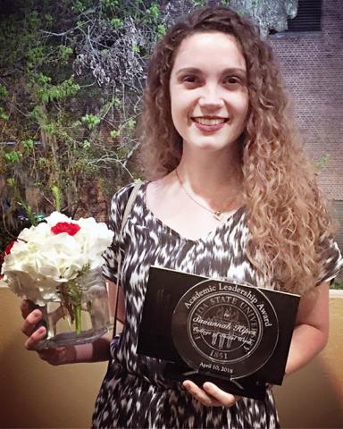 Savannah Hipes with her Academic Leadership Award.