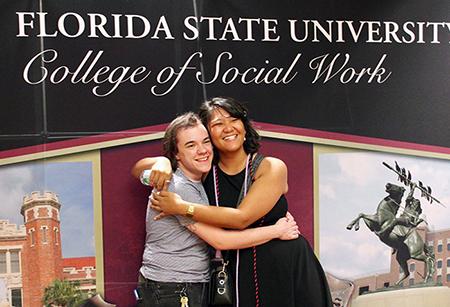 MSW Graduates Eliot Schmidt and Anne Nicole Dela Cruz. 