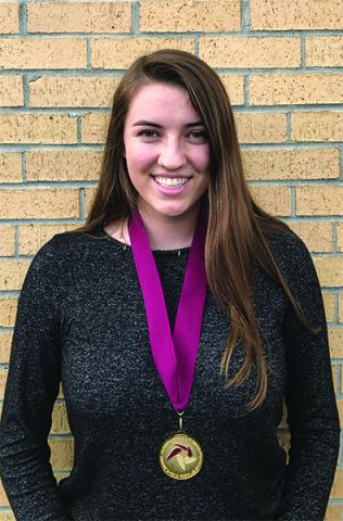 Hannon Kinnon with her Garnet and Gold Scholar Medal