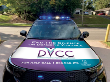 Law Enforcement Vehicle Wrapped in Domestic Violence Coordinating Council 