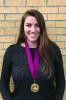Hannon Kinnon with her Garnet and Gold Scholar Medal