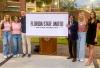 Olivia Pruit, Sydney Carrow, Jeff Binkley, Provost Jim Clark, Brenna Hopper, Kendall holding a sign that reads Florida State United One Voice Against Hate